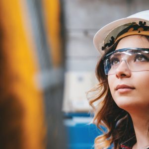 Young female engineer wearing a hard hat